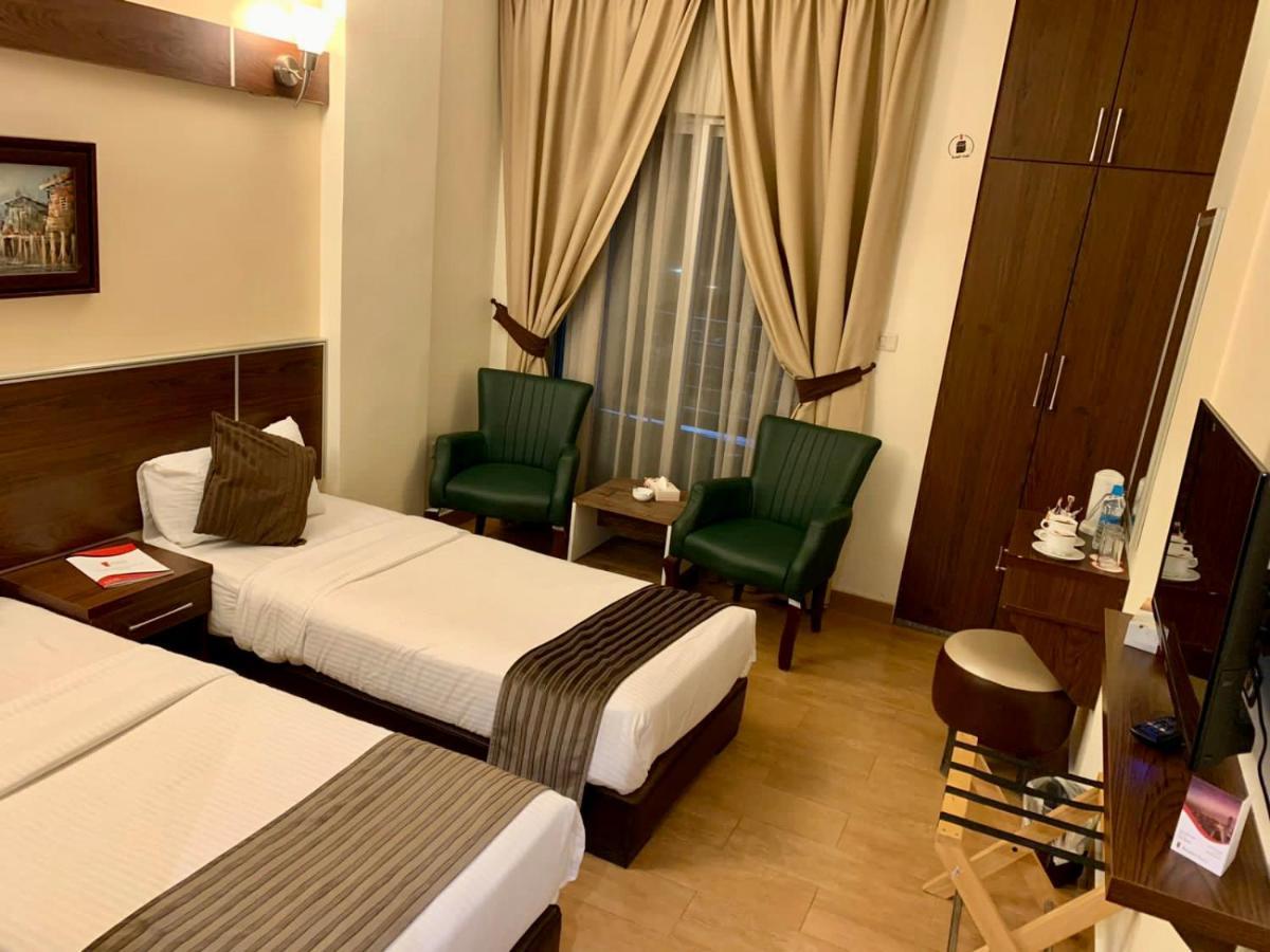 Ream Hotel Аман Екстериор снимка
