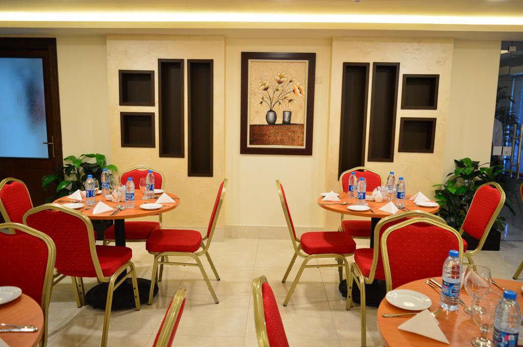 Ream Hotel Аман Екстериор снимка