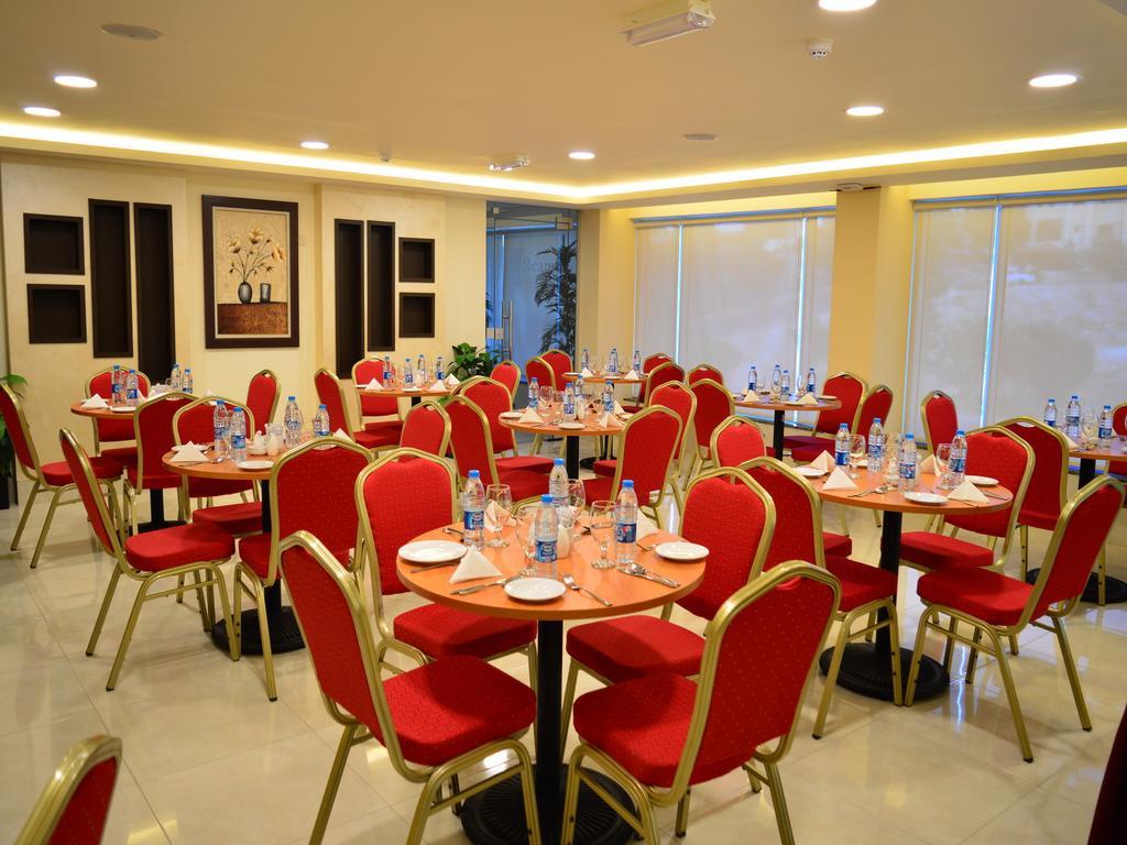 Ream Hotel Аман Екстериор снимка