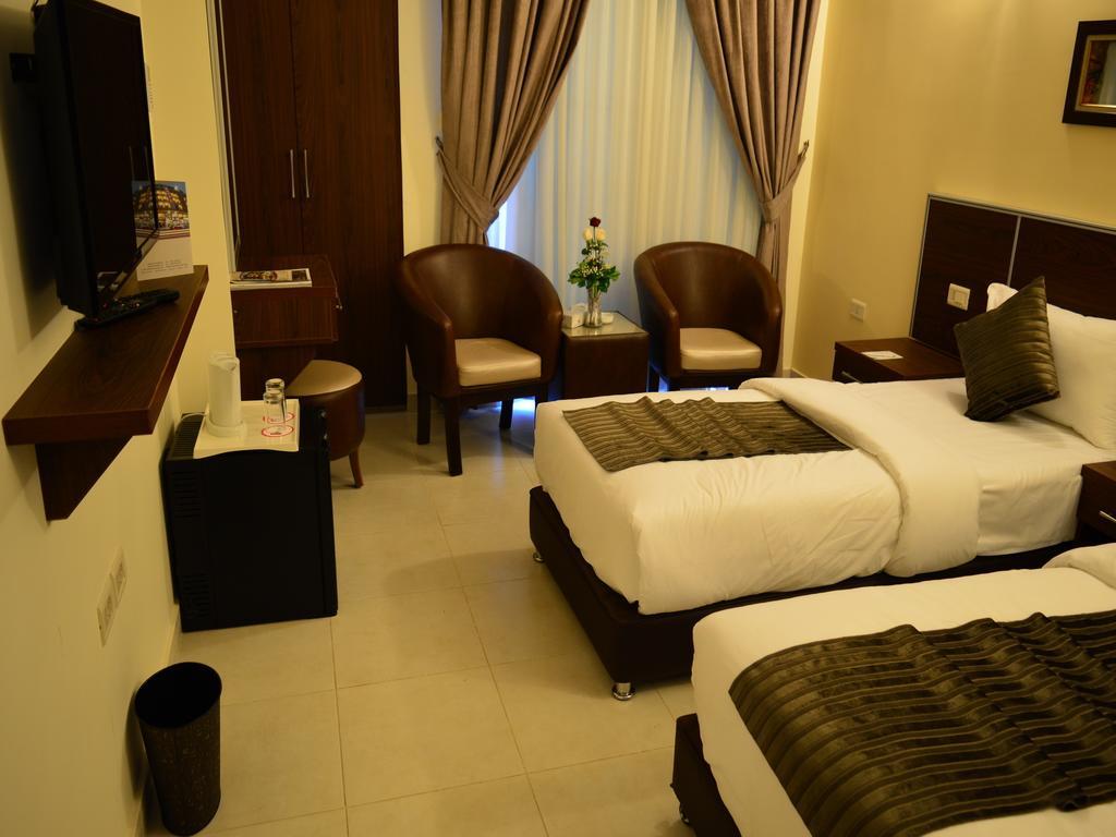 Ream Hotel Аман Екстериор снимка