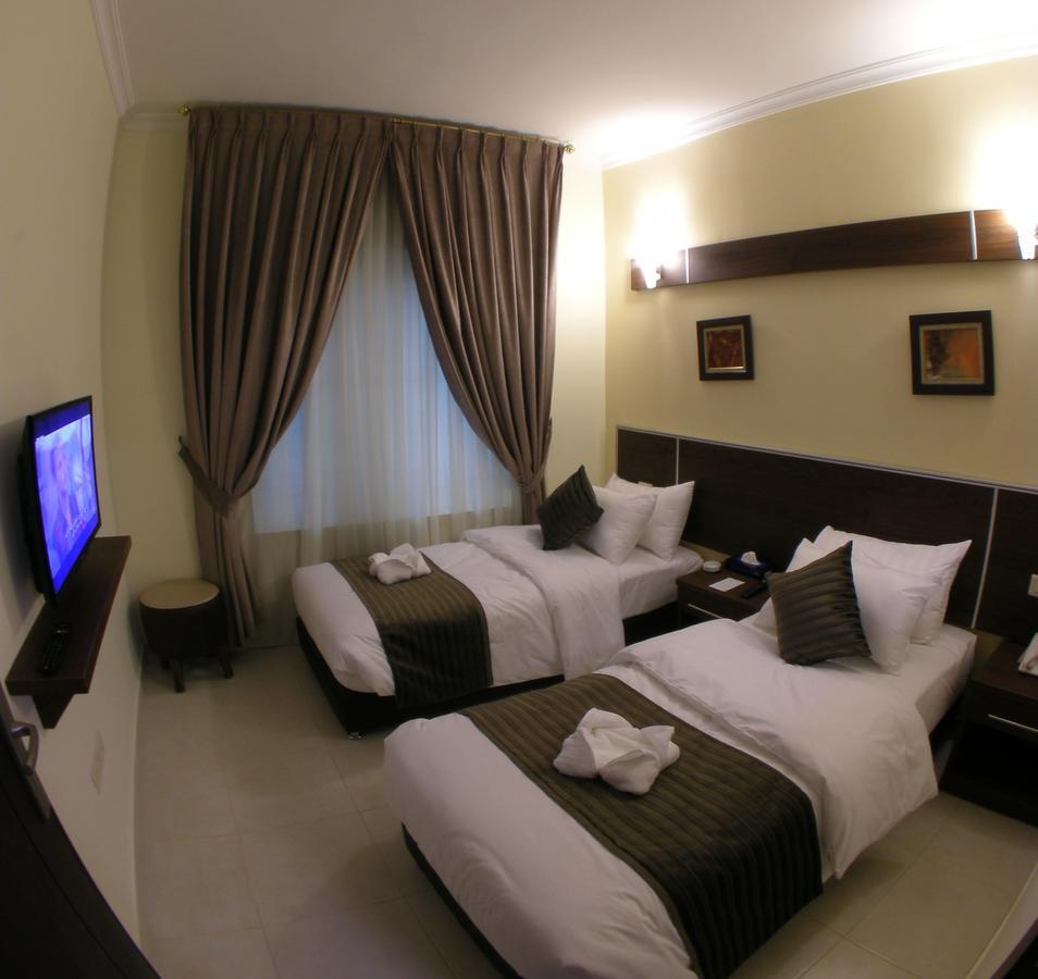 Ream Hotel Аман Екстериор снимка